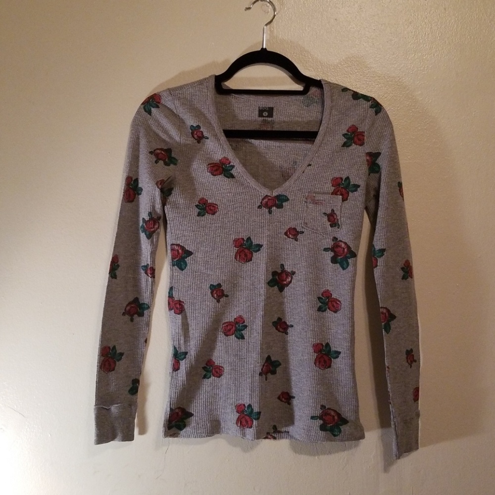 Grey, rosey shirt